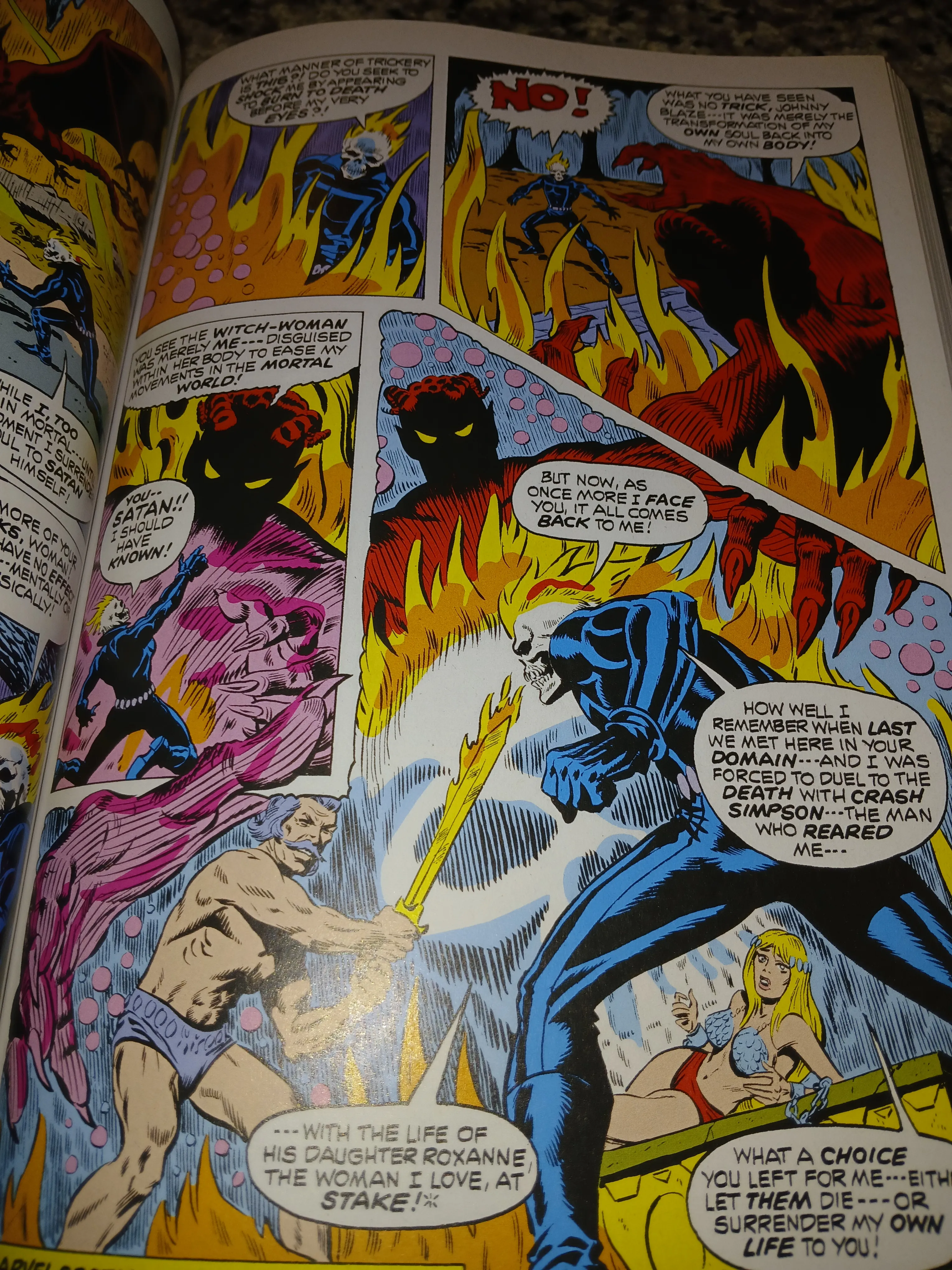 A panel showing the visceral confrontation between Ghost Rider and Satan, highlighting the personal stakes for Johnny Blaze. Ghost Rider Confronting Satan