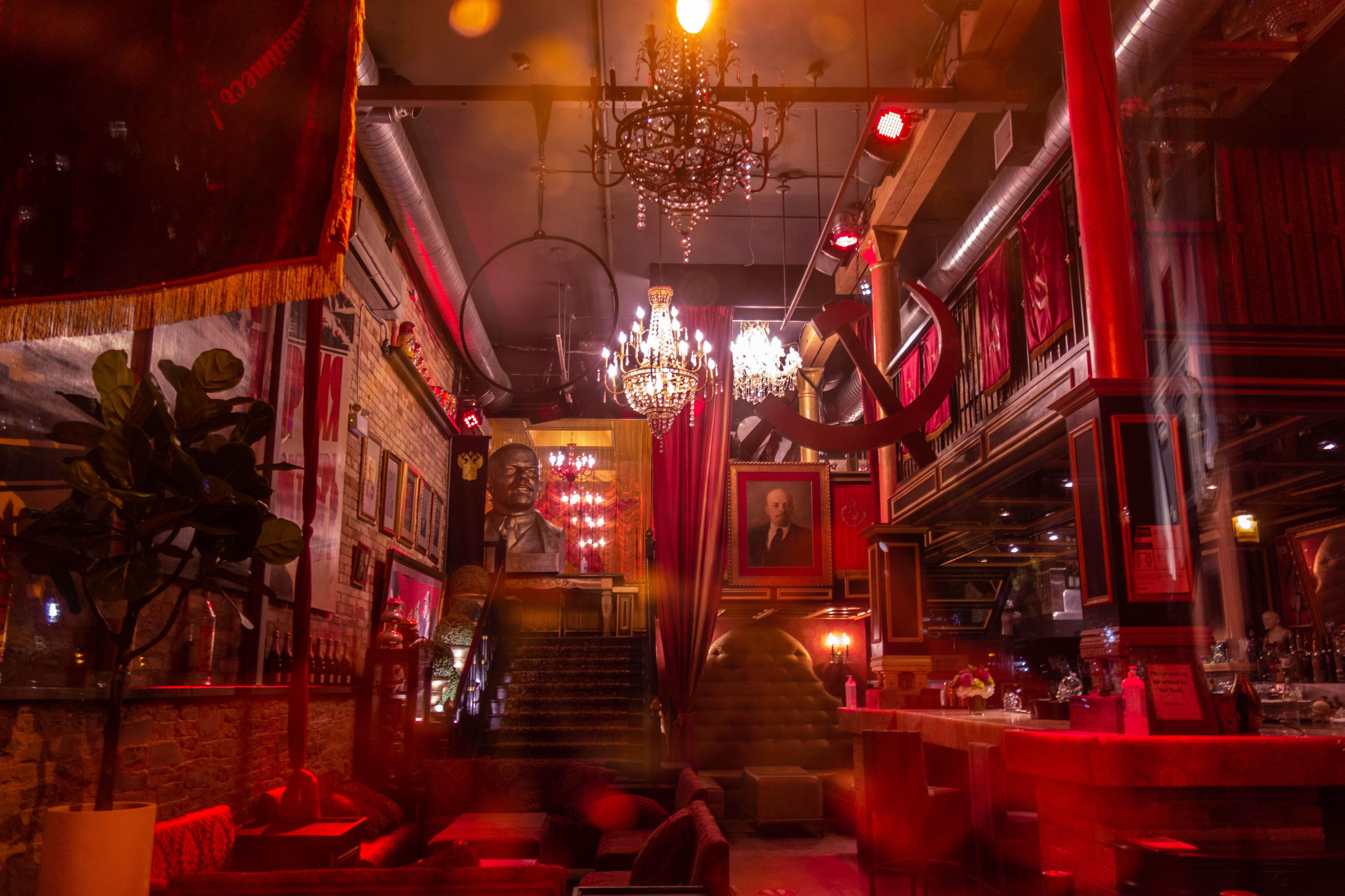 A wide shot of Pravda Vodka Bar, displaying a wide variety of Soviet-communist memorabilia