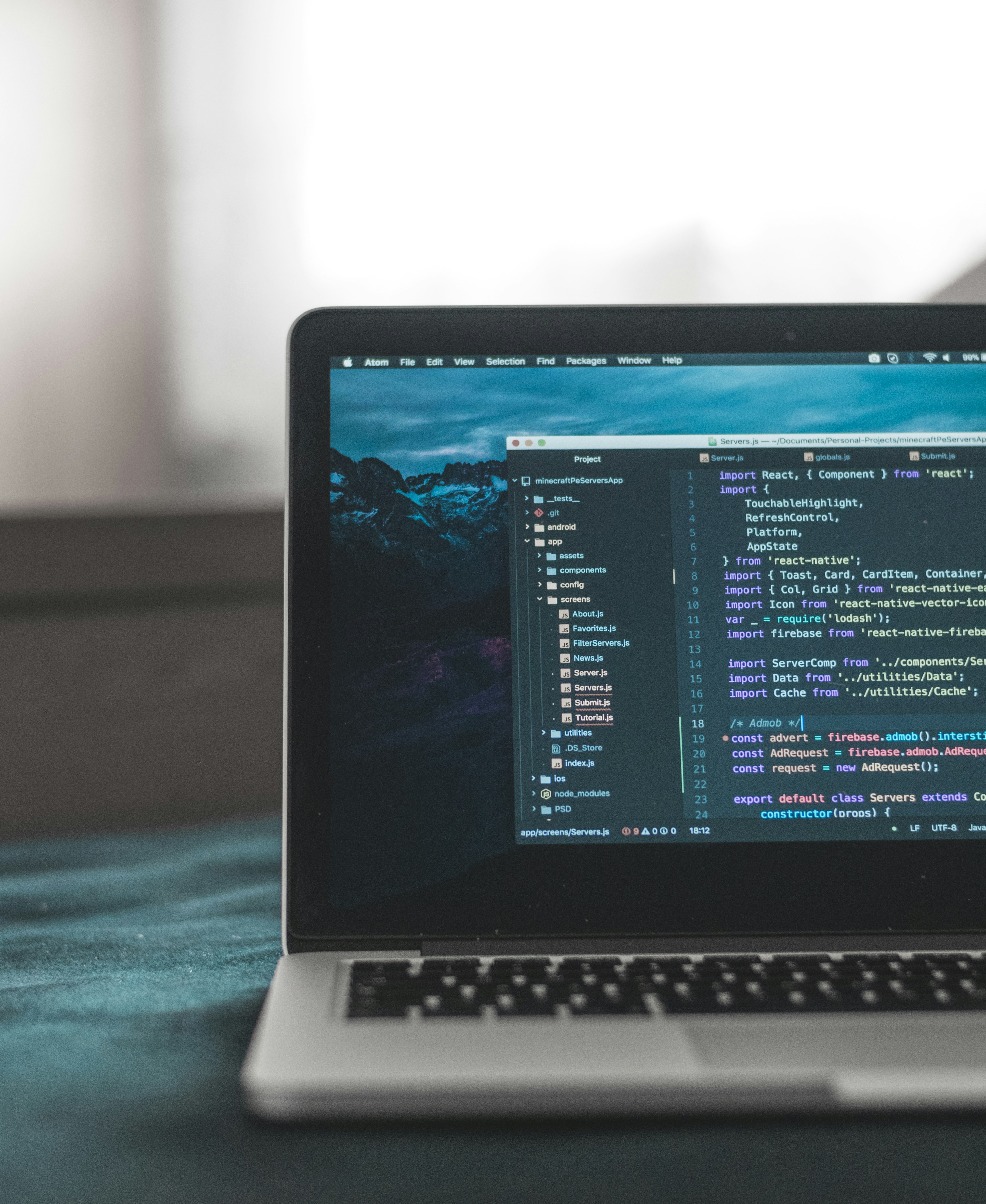 Macbook with code on the screen