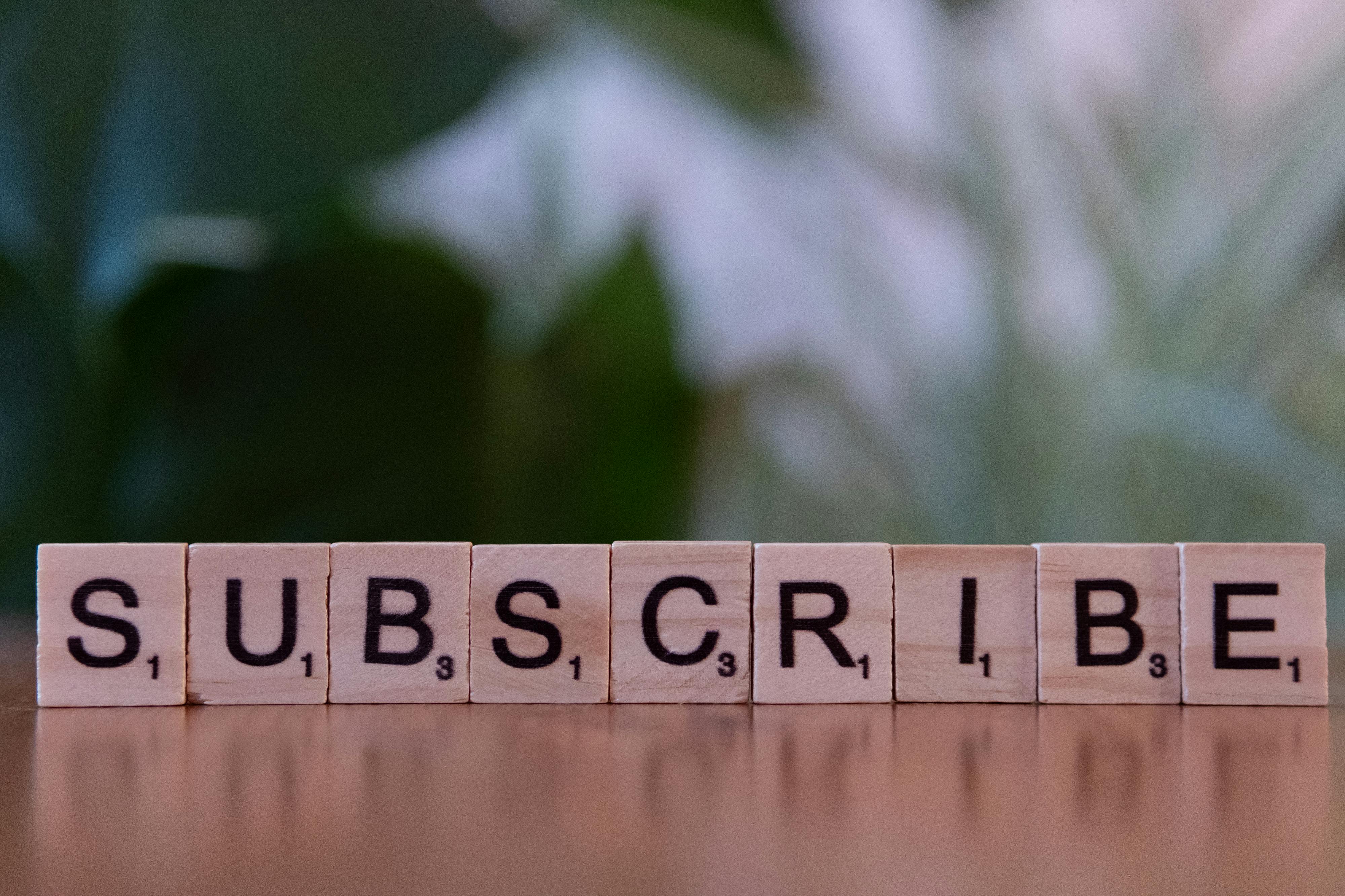Subscription written out in wooden block letters